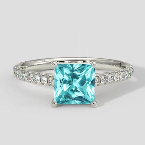 Kissenförmiger Paraiba-Ring mit Diamantpavé