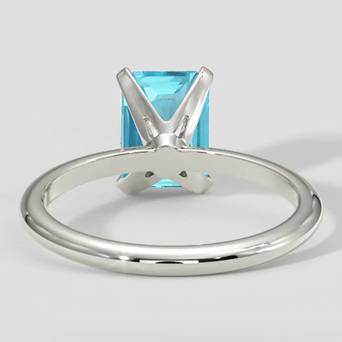 Paraiba-Ring im natürlichen Smaragdschliff aus Weißgold