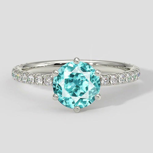 Runder Paraiba-Ring mit 6 Zinken und Diamantakzenten