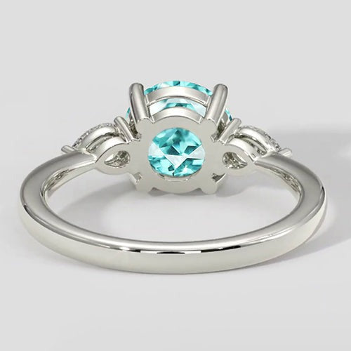 Runder Paraiba-Turmalinring mit drei Steinen