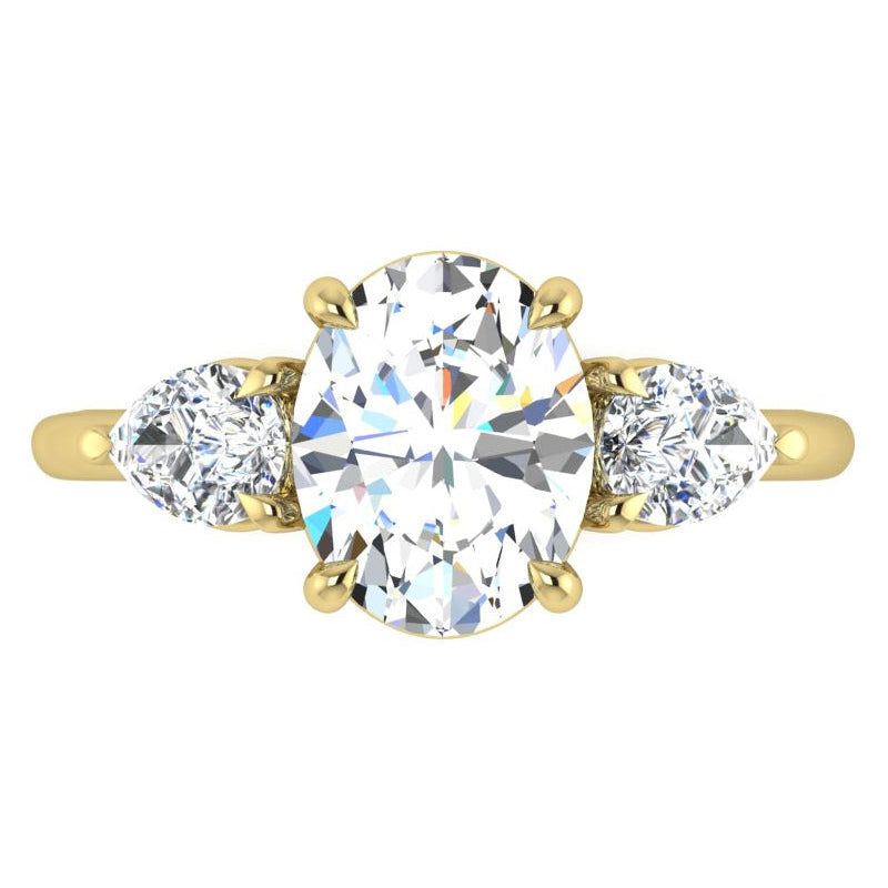 Trilogie Jubiläumsring Oval und Birnenschliff Diamanten