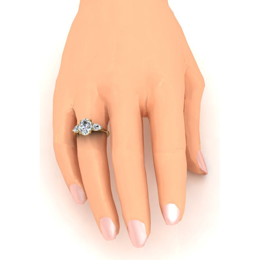 Trilogie Jubiläumsring Oval und Birnenschliff Diamanten