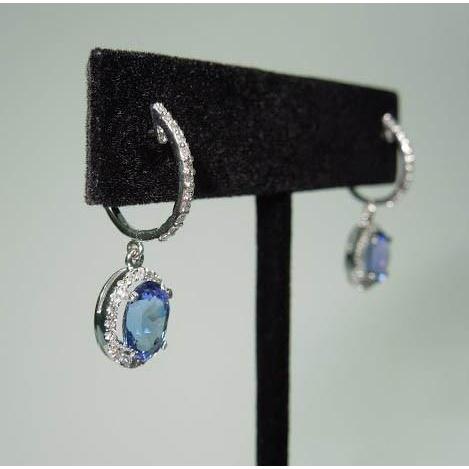 3,64 Karat Oval Tansanit & Runde Diamanten Creolen baumeln