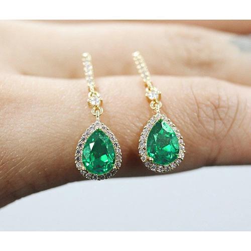 Birnenförmiger grüner Smaragd Halo Diamant Ohrring 7 Karat YG 14K