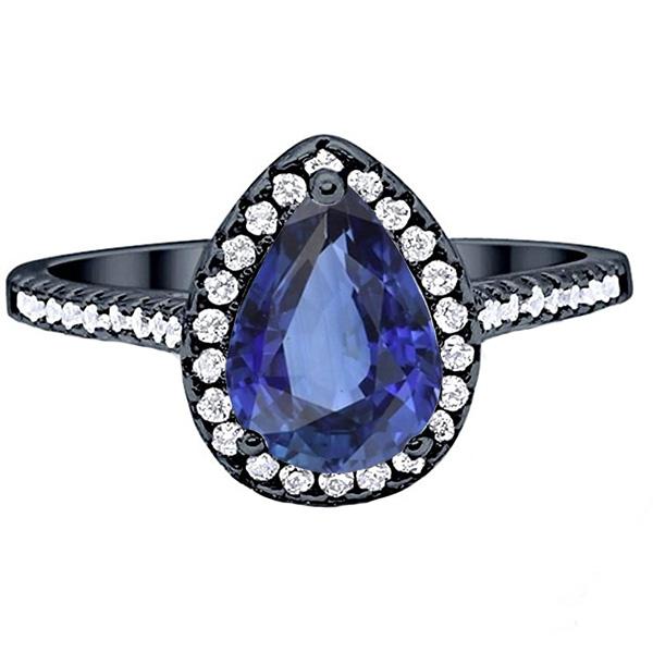 Birnenförmiger Halo-Ring aus Schwarzgold, blauer Saphir und Diamanten, 4 Karat - harrychadent.ch