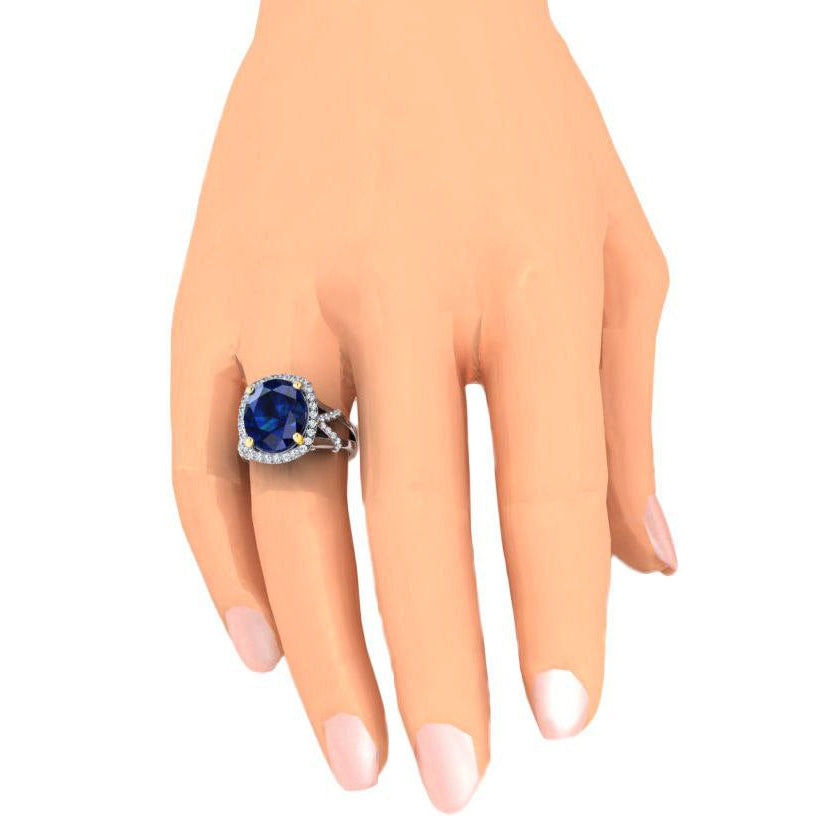 Ovaler blauer Saphir und Diamanten im Rundschliff-Edelsteinring 7.80 Karat