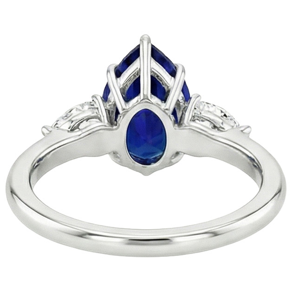 Drei-Stein-Goldring mit Ceylon-Saphir und Diamant im Birnenschliff 6.75 Karat