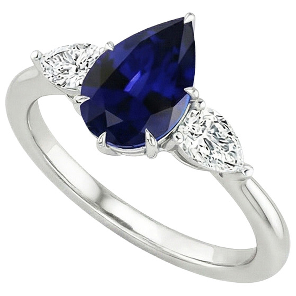 Drei-Stein-Goldring mit Ceylon-Saphir und Diamant im Birnenschliff 6.75 Karat