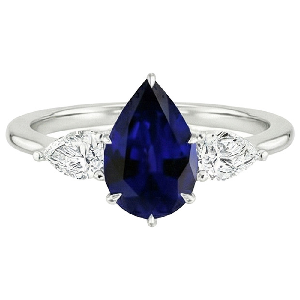 Drei-Stein-Goldring mit Ceylon-Saphir und Diamant im Birnenschliff 6.75 Karat