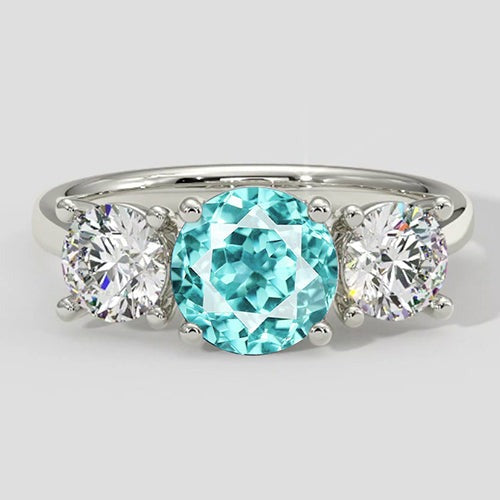 Drei-Stein-Ring mit Paraiba-Turmalin und rundem Diamanten