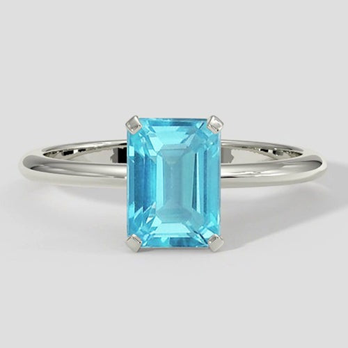 Paraiba-Ring im natürlichen Smaragdschliff aus Weißgold