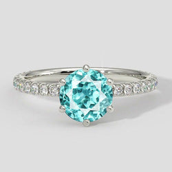 Runder Paraiba-Ring mit 6 Zinken und Diamantakzenten