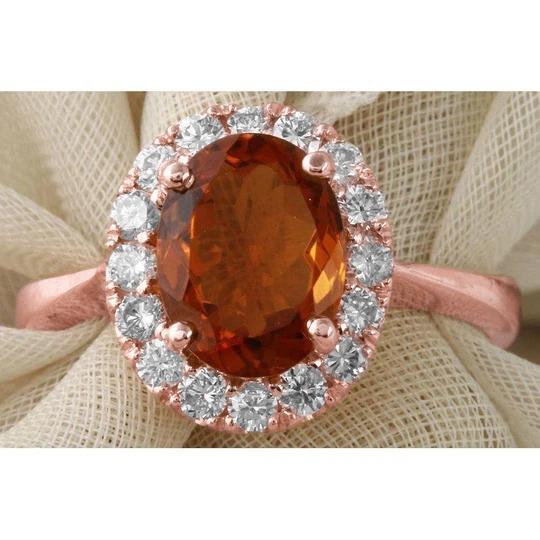 14K Roségold Ehering mit Citrin und Diamant im Ovalschliff 27.50 ct. - harrychadent.ch