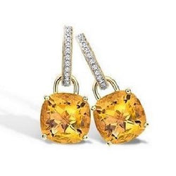 Ohrringe mit Citrin und Diamanten aus Gelbgold 40,70 ct