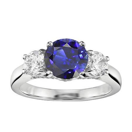 2 Karat Drei-Steine-Ring runder natürlicher blauer Saphir & Diamanten - harrychadent.ch