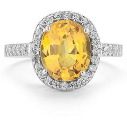 23 Karat Gelbgold-Ehering mit Citrin und Diamant im Ovalschliff Weißgold