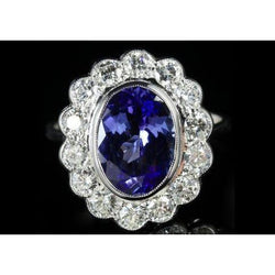 5,15 Kt Ovaler Lünettensatz Tansanit mit Diamanten Ring 14K Weißgold