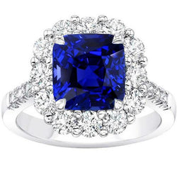 5.50 Karat Halo Kissen Tiefblauer Saphirring & Diamantschmuck
