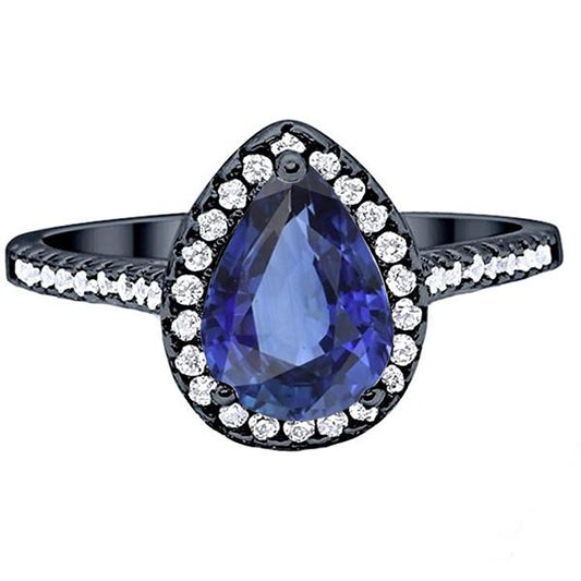 Birnenförmiger Halo-Ring aus Schwarzgold, blauer Saphir und Diamanten, 4 Karat - harrychadent.ch
