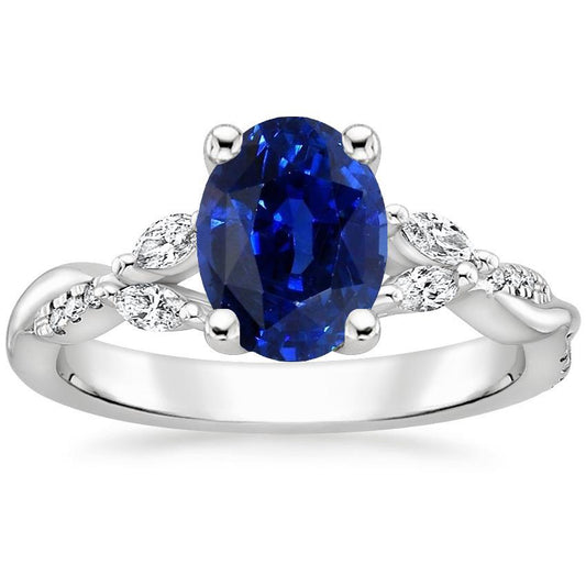 Blauer Saphir-Edelsteinring mit Marquise und runden Akzenten 4,50 Karat - harrychadent.ch