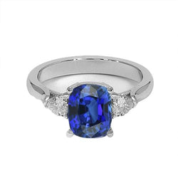 Blauer Saphir mit drei Steinen und Birnendiamanten Ring 4,50 Karat Gold 14K