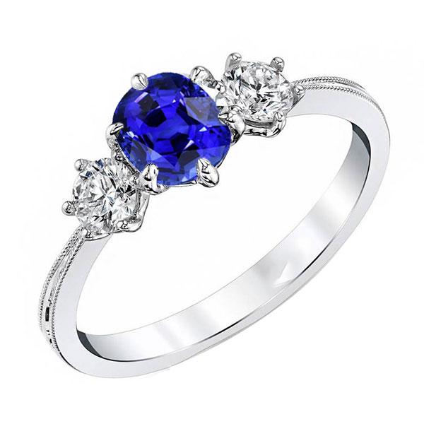 Gold Saphirring mit drei Steinen im Kissenschliff 2 Karat Damenschmuck - harrychadent.ch