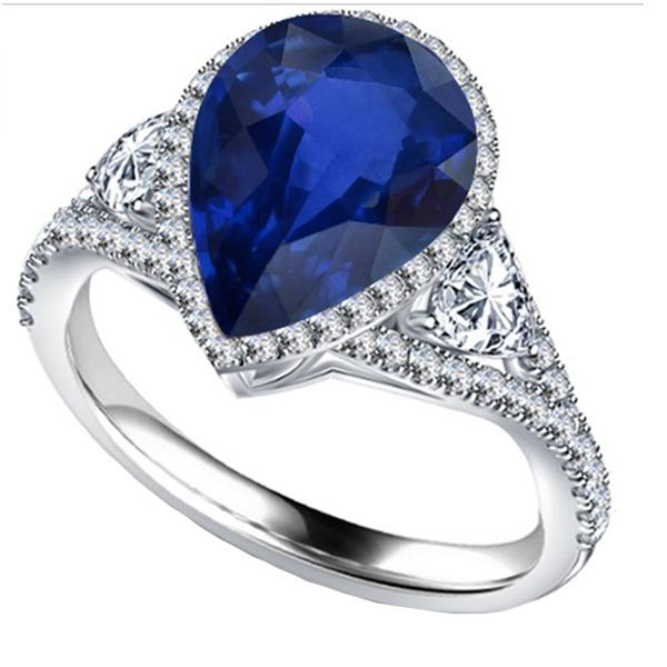 Halo Goldring blauer Saphir mit Diamant-Seitensteinen 4,50 Karat - harrychadent.ch