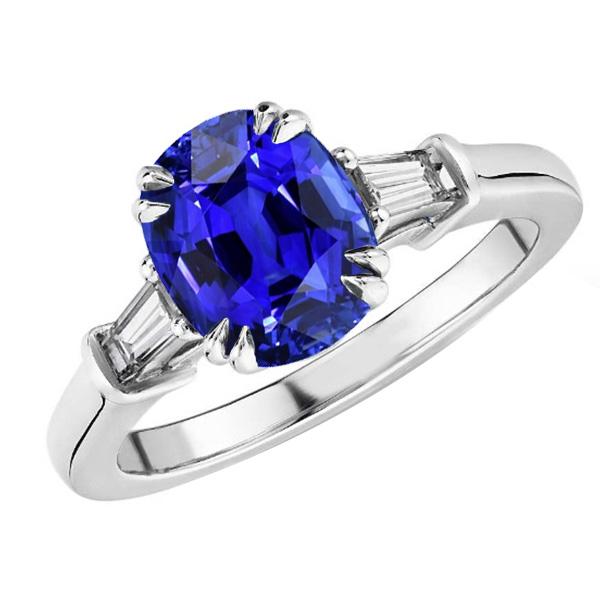 Ovaler blauer Saphirring mit drei Steinen und Baguette-Diamant 3,25 Karat - harrychadent.ch