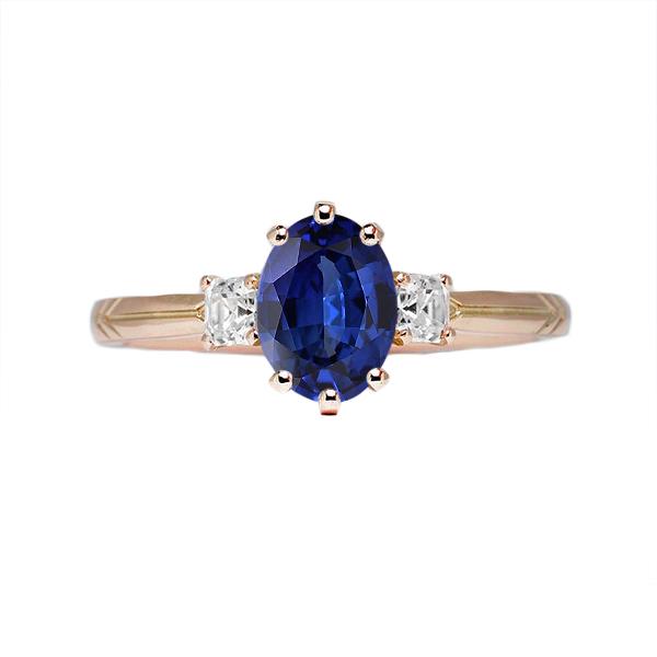 Ovaler blauer Saphirring mit drei Steinen und Diamanten 2,50 Karat - harrychadent.ch