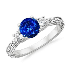 Ring mit 3 Steinen. 2.60 ct. srilankischer Saphir und Diamanten. WG 14K