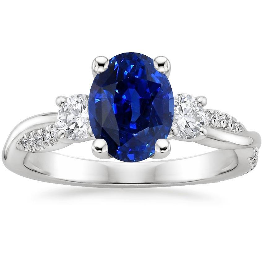 Ring mit drei Steinen Ovaler blauer Saphir & runde Diamantakzente 4 Karat - harrychadent.ch