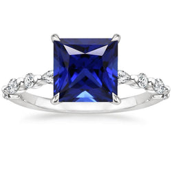 Ring mit runden und birnenförmigen Diamanten mit blauem Saphir im Princess-Schliff 5,25 Karat