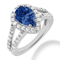Ring mit srilankischem Saphir und runden Diamanten im Birnenschliff, 4 Karat