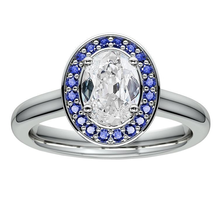 Goldener Halo-Ring Ovaler Diamant im Altschliff mit runden Saphiren 5,75 Karat - harrychadent.ch