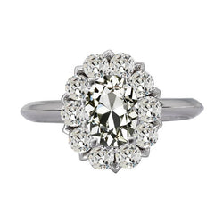 Halo Ring Rund & Oval alter Bergmann Diamant Flower Style 9 Karat Gold