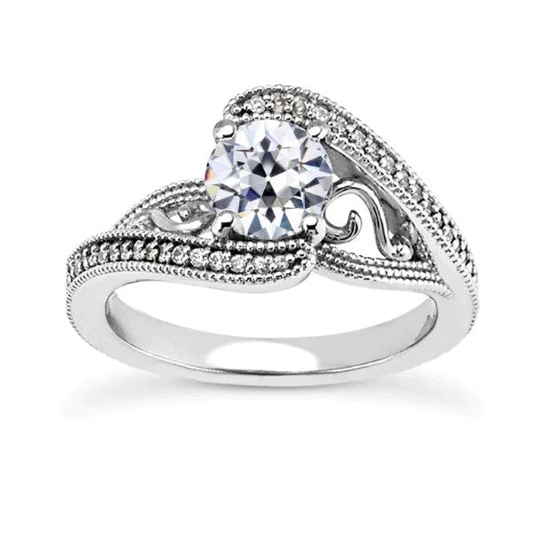 https://harrychadent.com/products/milligrain-halo-anniversary-ring-old-mine-cut-diamond-4-carats